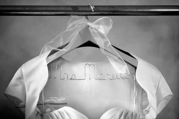 custom wedding dress hanger - photo by Florida based destination wedding photographer Chip Litherland of Eleven Weddings